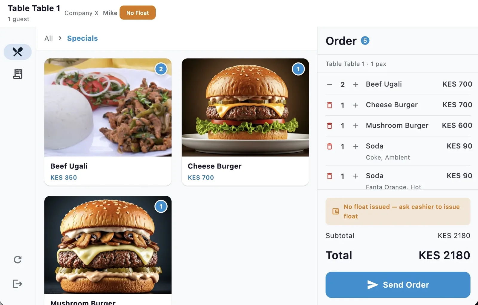 Fast food staff taking an order on a tablet to bust the queue